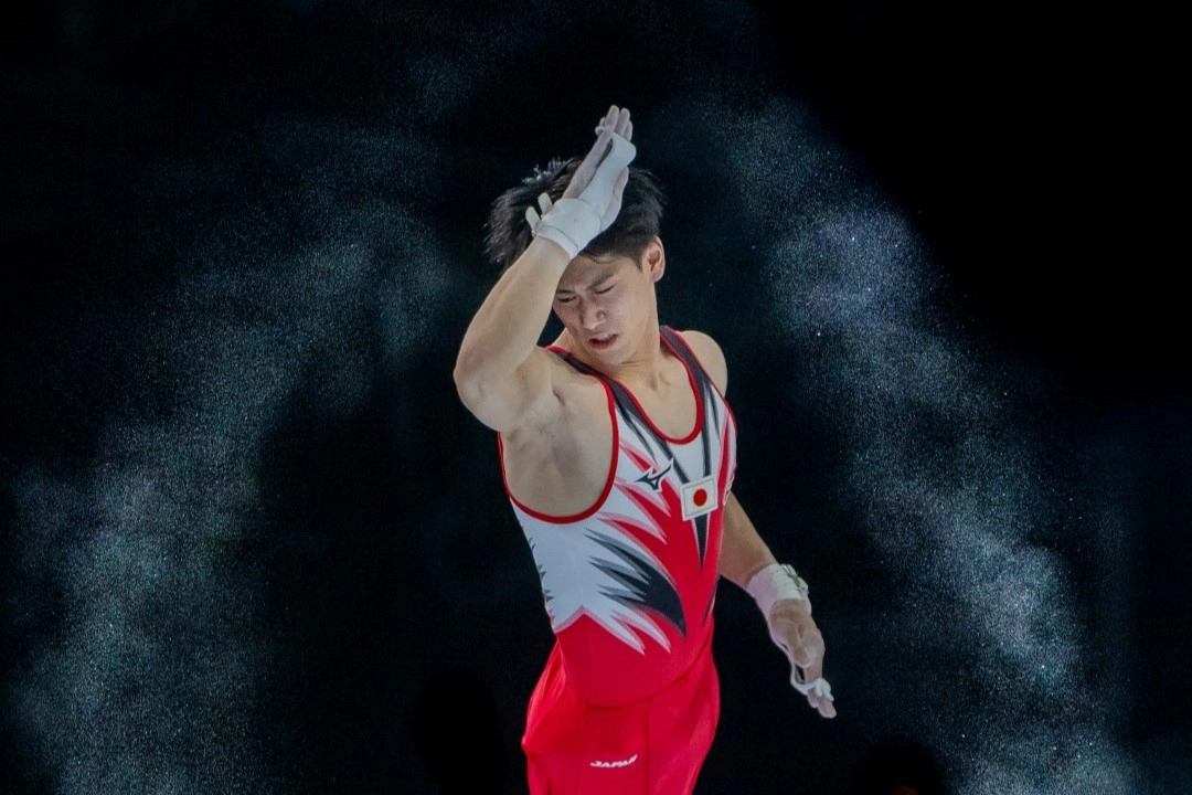 The Most Beautiful Sports Photo of the Year: A Flying Gymnast in a Cloud of Chalk